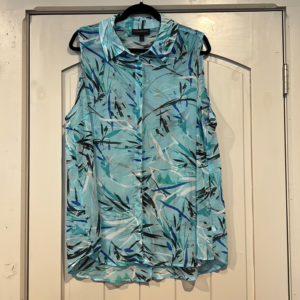 Lane Bryant sheer tank top with split open lower back, great used condition.